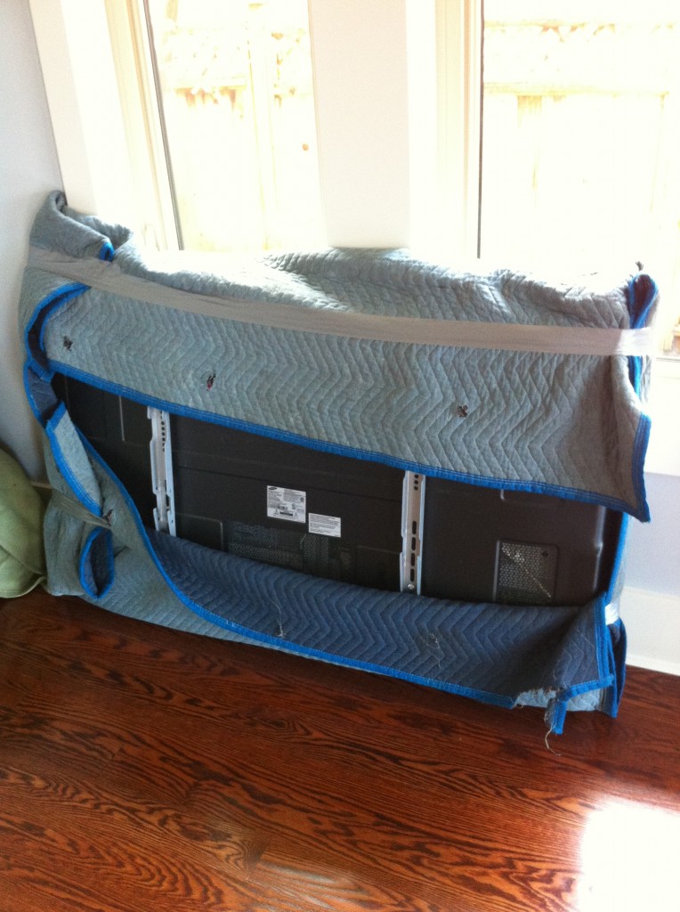 Large Flat Screen Pickup and Delivery Service Transporting Plasma TV